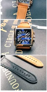 Square quartz watch for men with blue dial and leather strap stylish fashion timepiece.