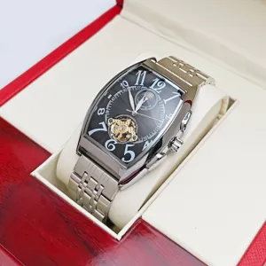 Luxury tonneau automatic mechanical watch for men featuring skeleton dial and tourbillon.