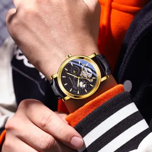 Men's automatic mechanical watch with luxury starry dial gold case and genuine leather strap.