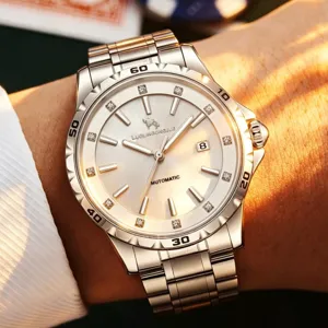 Stainless steel automatic men watch with mother of pearl dial worn on wrist, luxury style.