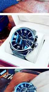 Oversized men's quartz watch with unique crown guard and bold dial for fashion business style.