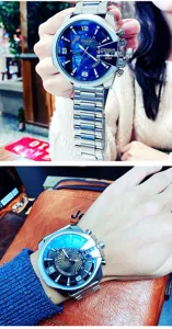 Men's oversized quartz watch with striking blue dial and durable metal strap for business wear.