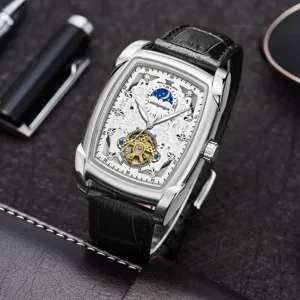 Men's automatic mechanical watch with tonneau hollow carved dial and luxury leather strap.