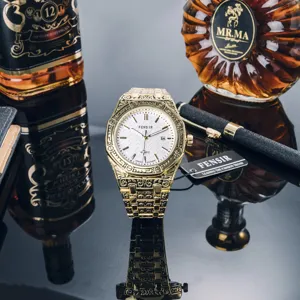 Gold quartz watch for men featuring vintage carved stainless steel band and white dial.
