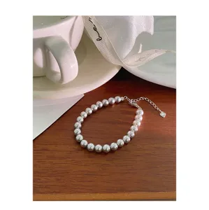 Élégant bracelet de perles en argent S925, photo de détail, mode de luxe minimaliste au quotidien.