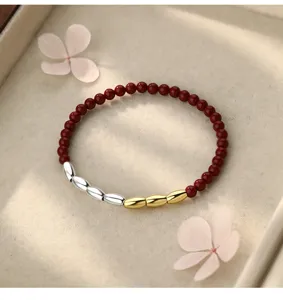 Neu-chinesischer Stil Cinnabar und Metall Reiskörner Armband, elegantes tägliches Schmuckstück.