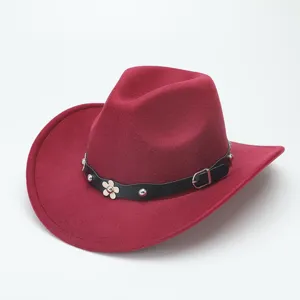 Detailed view of the stylish red felt western cowboy hat with studded leather strap.