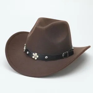 Close-up of brown felt western cowboy hat detail, showcasing the black leather flower studded band.