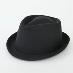 Classic black felt fedora hat with a small brim, perfect for retro British style outfits.