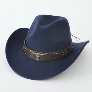 Close-up of navy blue felt cowboy hat with brown studded leather band and metal bull skull decoration.