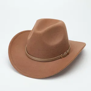 Close-up detail of the brown wool western cowboy hat, showing fine texture and belt accent.