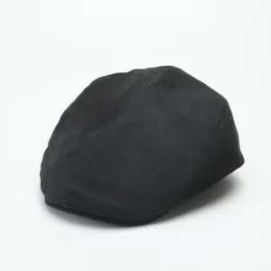 Black vintage flat cap for women, classic newsboy beret style, retro spring autumn hat.
