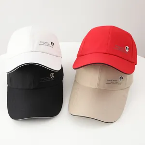 Detailed shot of casual baseball caps with embroidered shield logo, multi-color option.