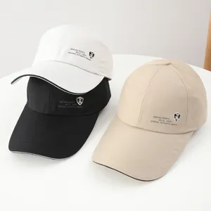 Casual cotton baseball cap with shield logo print, stylish outdoor sun hat for men and women.