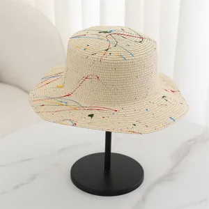 Summer flat top straw hat with colorful graffiti splash print, ideal for sun protection beach.