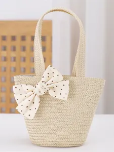 Bonita bolsa de mano de paja para niños en verano playa bolso con elegante lazo de lunares
