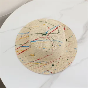 Summer flat top straw hat with artistic colorful paint splatter graffiti design beach sun hat