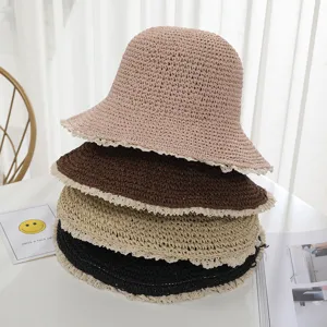 Women's crochet straw hat with lace edge, casual foldable sun protection bucket hat for summer beach wear.