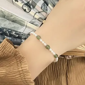 Elegante sterling zilveren jade en parel armband voor vrouwen, delicate sieraden.