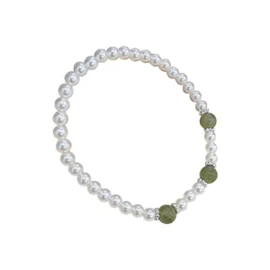 Elegante dames armband van zilver parels en groene jade kralen stijlvolle modesieraden.