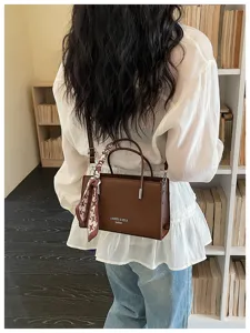 Stylish brown shoulder bag for women, trendy PU leather crossbody small square bag with scarf.