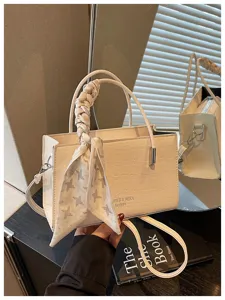 White crocodile pattern crossbody tote bag with chic printed silk scarf for women stylish daily use.