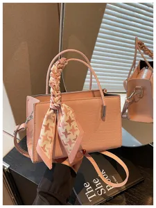 Pink crocodile pattern tote bag with scarf handle, stylish womens crossbody shoulder bag.