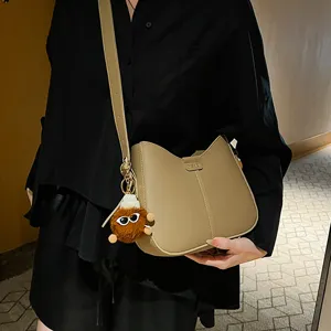 Retro Simple Solid Color Large Capacity Shoulder Crossbody Bag With Cute Plush Doll Pendant