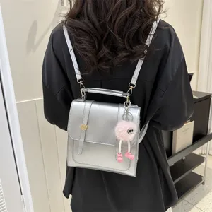 Sac à dos décontracté élégant en argent métallique pour femmes, sac tendance pour navetteurs.