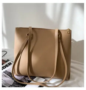Minimalist beige tote bag for women, large capacity stylish shoulder bag for daily use.