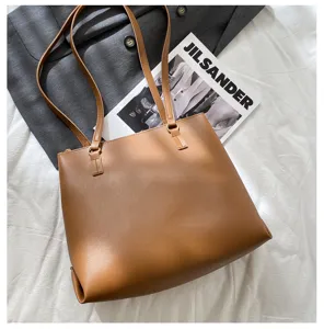 Brown PU leather tote bag for women, large capacity shoulder handbag for autumn style.