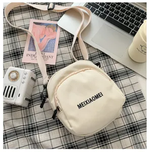 Ins style canvas crossbody bag for women, cute small shoulder bag with adjustable strap.