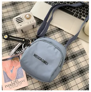 Korean style fashion canvas crossbody shoulder bag for women cute casual blue bag detail view.