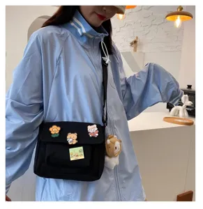 Cute canvas crossbody bag for women, Japanese Harajuku style casual shoulder bag with pins.