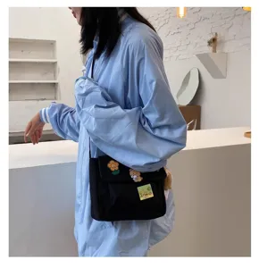 Casual Harajuku canvas crossbody bag for women, cute cartoon bear patch single shoulder bag.