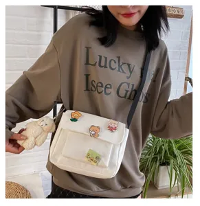 Cute canvas crossbody bag for women, Japanese Harajuku style student shoulder bag with pins.