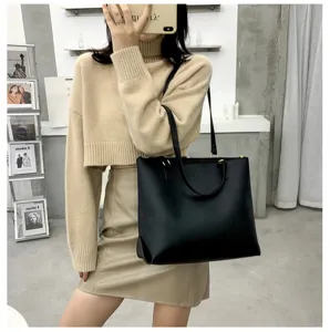Elegant black leather tote bag for women, large capacity minimalist shoulder bag daily wear.