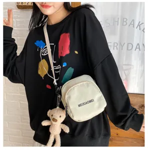 Korean style fashion canvas cross-body bag for women, cute single shoulder bag with bear pendant