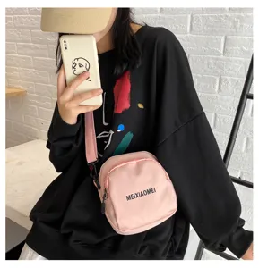 Korean style cute canvas crossbody bag for women, pink casual shoulder bag with letter print.