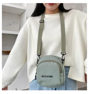 Women canvas crossbody bag casual small shoulder bag fashion student daily use handbag.