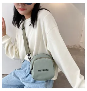 Korean style canvas crossbody bag for women, cute fashion shoulder bag for students.