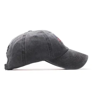 Side detail view of the dark grey washed cotton baseball cap with American flag embroidery.