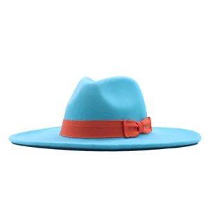 Blauer Schlapphut mit breiter Krempe und orangefarbener Schleife, eleganter Wollfilzhut.
