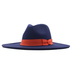 Dunkelblauer Woll-Fedora-Hut mit breiter Krempe und leuchtend orangefarbener Schleife für Damen.
