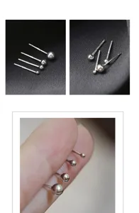 Detailaufnahme von Ohrringen mit silbernen Kugeln in verschiedenen Größen und feiner.
