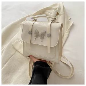 White shiny mini backpack with metal butterfly decor chic casual daily school travel bag for women