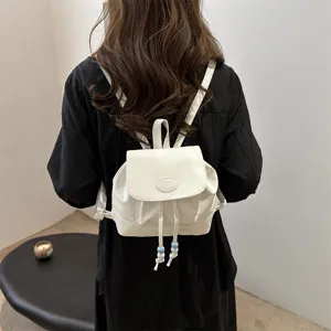 Petit sac à dos blanc pour femme sac bandoulière cuir PU mignon avec cordon perles