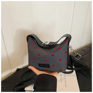 Grey red polka dot canvas shoulder bag detail, stylish women's crossbody casual handbag.