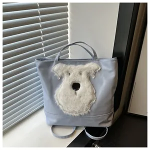 Leuke lichtblauwe shopper tas met pluizige hond applicatie multifunctionele rugzak dames