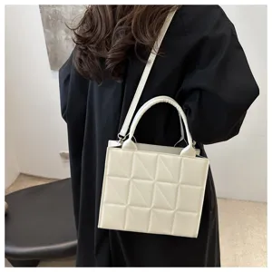 White quilted shoulder bag detail, stylish PU leather handbag with top handle and strap.